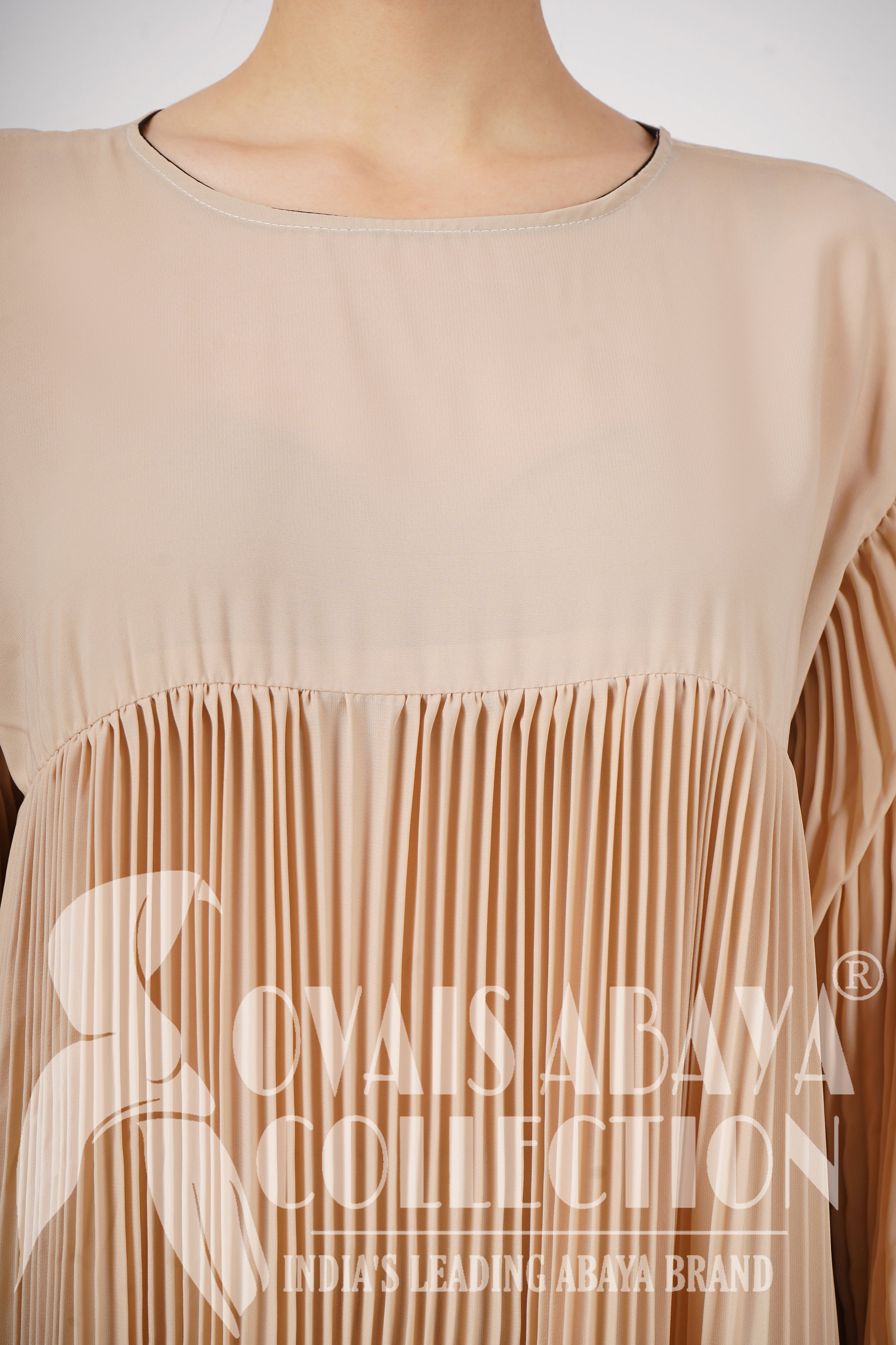 RIDA Beautiful Frill Plates work Abaya - NUDE ( HIGHLY CUSTOMER DEMAND )